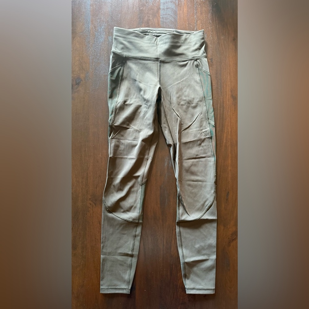 Lululemon Running Leggings with mesh accents, side pockets and adjustable waist